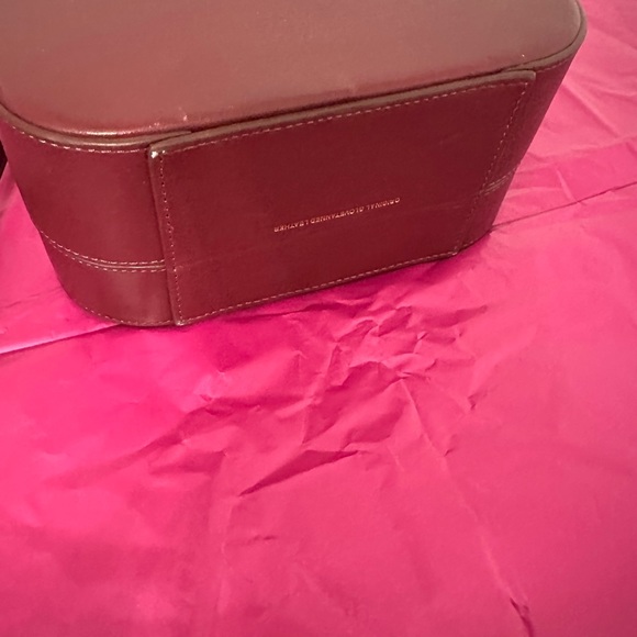 Burgundy Coach crossbody bag. Button open. Long shoulder strap. Leather. - Picture 3 of 6